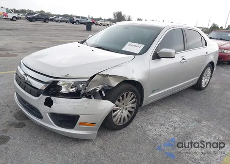 2012 Ford Fusion Hybrid z USA, uszkodzony, nr VIN 3FADP0L35CR281029